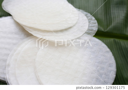 Stacked round sheets of Vietnamese rice paper Stacked round sheets of Vietnamese rice paper 129301175