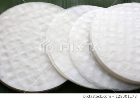 Stacked round sheets of Vietnamese rice paper 129301178