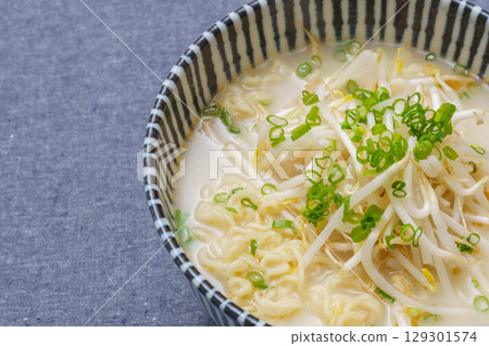 Close-up of miso ramen topped with bean sprouts and green onions 129301574