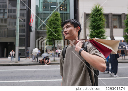 Profile of a man shopping in Ginza Profile of a man shopping in Ginza 129301874