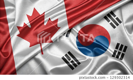 Canadian and South Korean Flags Overlapping in a Harmonious Arrangement 129302314