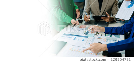 Team business meeting presentation. Hand businessman working project in modern office.Laptop computer and tablet 129304751