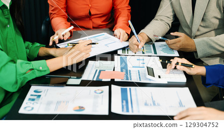 Team business meeting presentation. Hand businessman working project in modern office.Laptop computer and tablet 129304752