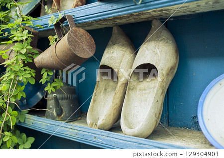 Typical Dutch Clogs Leaning on the Ledge 129304901