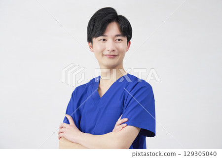 Doctor, nurse, dentist, caregiver male portrait white background Doctor, nurse, dentist, caregiver male portrait white background 129305040