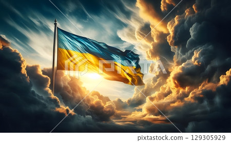 Ukrainian Flag Waving with Dramatic Sky. гse in patriotic, cultural, postcards or backgrounds. 129305929