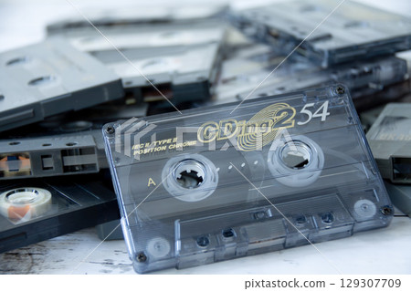 Piles of cassette tapes 129307709
