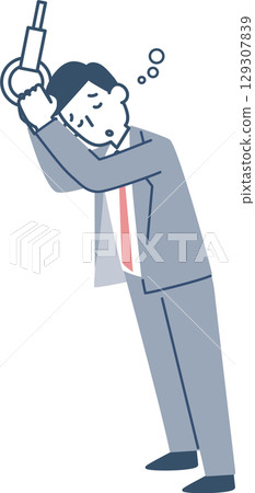 An office worker dozing off while holding onto a strap 129307839
