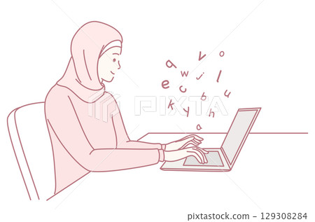 A woman in a hijab works on her laptop, engaging in digital communication and content creation 129308284