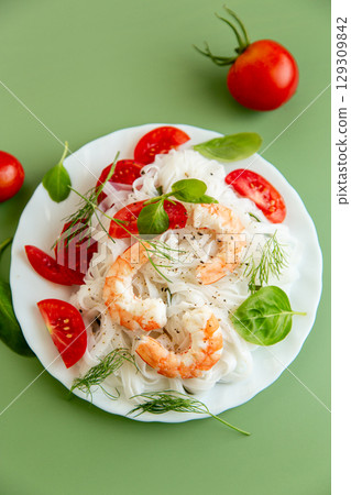 Light fitness salad of rice noodles shrimp and fresh herbs Light fitness salad of rice noodles shrimp and fresh herbs 129309842