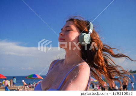 Blissful Beach Vibes with Headphones 129310055