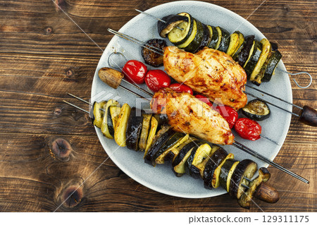 Grilled chicken skewers. 129311175