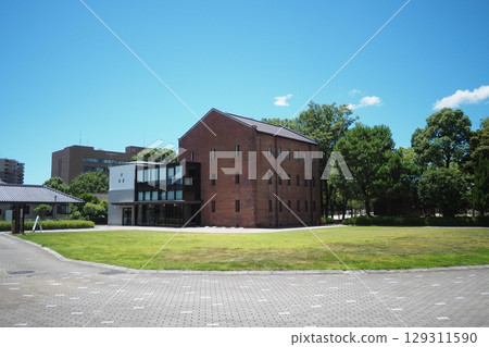 Red brick building against the blue sky Red brick building against the blue sky 129311590