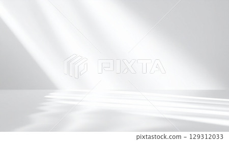 A room with a water surface that evokes a sense of moisture and transparency. An abstract background of soft reflections and shadows in a white space with light streaming in. 129312033
