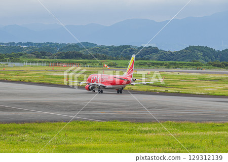 An airplane running on the runway at Mt. Fuji Shizuoka Airport in Makinohara City (Shizuoka Prefecture) 129312139