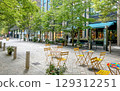 Tokyo Marunouchi Nakadori Street with yellow chairs for resting 129312251