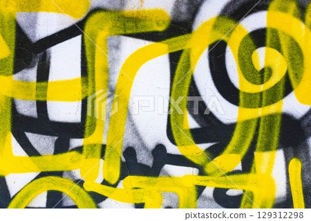 Yellow and Black Graffiti Swirl Design with Bold Lines for Urban 2000s Style 129312298