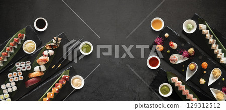 Mix of japanese sushi rolls and sauces Mix of japanese sushi rolls and sauces 129312512
