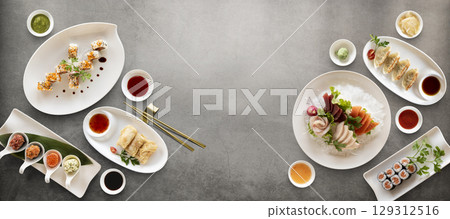 Mix of japanese sushi rolls and sauces Mix of japanese sushi rolls and sauces 129312516