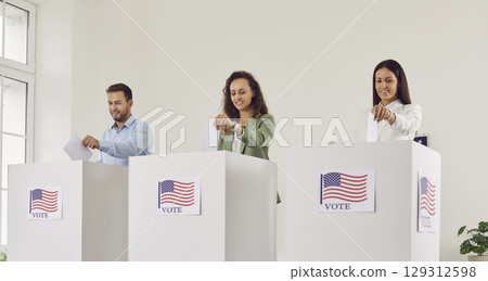 People have cast their deciding vote and throw ballots into ballot box at same time. People have cast their deciding vote and throw ballots into ballot box at same time. 129312598