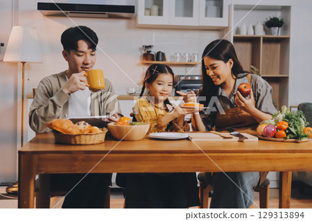 Family spends their free time together 129313894