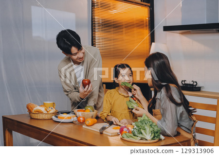 Family spends their free time together 129313906