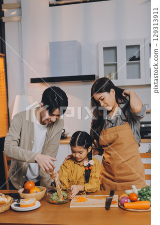 Family spends their free time together Family spends their free time together 129313911