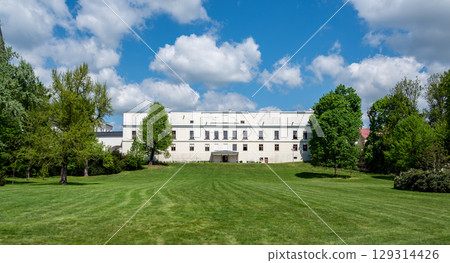 Historic Frystat Chateau in Karvina, Czech Republic, captured from a frontal view. Elegant architecture surrounded by greenery, reflecting the charm of Central European heritage. 129314426