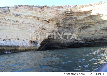 Sunlit Coastal Cliff in Algarve, Portugal Sunlit Coastal Cliff in Algarve, Portugal 129314911
