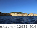 Sunlit Coastal Cliff in Algarve, Portugal 129314914