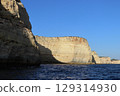 Sunlit Coastal Cliff in Algarve, Portugal 129314930