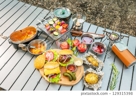 Outdoor cooking at a campsite on holiday 129315398