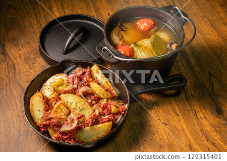 Outdoor cooking at a campsite on holiday 129315401