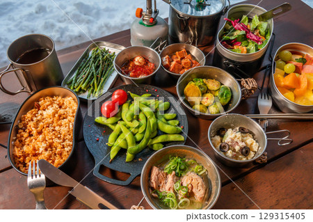 Outdoor cooking at a campsite on holiday 129315405