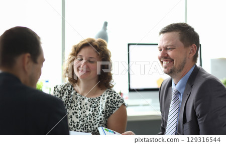 Engaging teamwork creates innovative solutions during a collaborative meeting at a modern office space in 2023 129316544