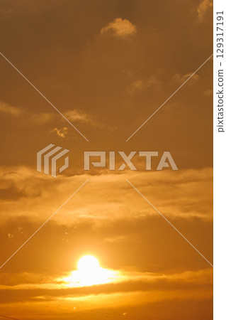 sunset seen through clouds 129317191