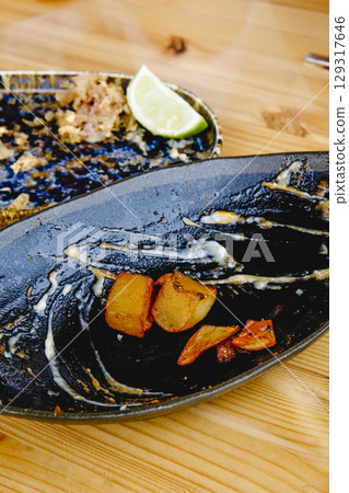 patatas bravas and chipirones leftovers patatas bravas and chipirones leftovers 129317646