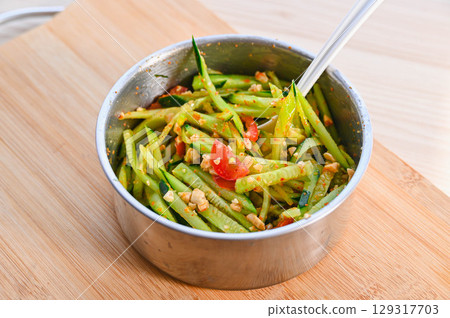 Making cucumber som tam Making cucumber som tam 129317703