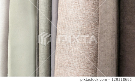 Different textured fabrics in various neutral tones, including beige, gray and brown Different textured fabrics in various neutral tones, including beige, gray and brown 129318695