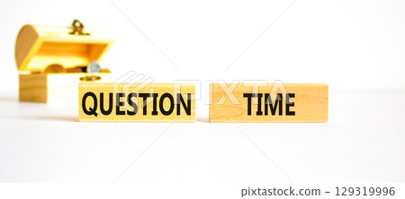 Question time symbol. Concept words Question time on beautiful wooden blocks. Beautiful white background. Wooden chest with coins. Business and question time concept. Copy space. Question time symbol. Concept words Question time on beautiful wooden blocks. Beautiful white background. Wooden chest with coins. Business and question time concept. Copy space. 129319996