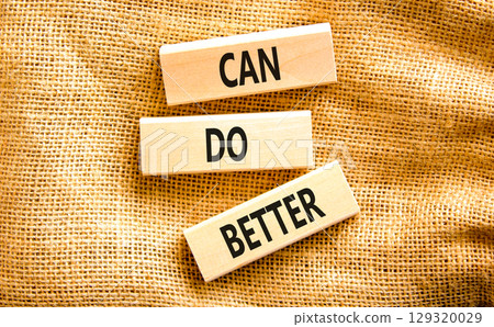 Can do better symbol. Concept words Can do better on beautiful wooden block. Beautiful canvas table canvas background. Business and can do better concept. Copy space. 129320029