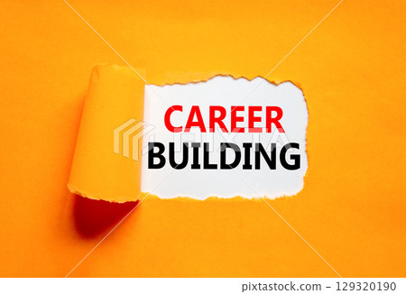 Career building symbol. Concept words Career building on beautiful white paper. Beautiful orange table orange background. Business, motivational career building concept. Copy space. 129320190