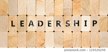 Leadership symbol. Concept word Leadership on beautiful wooden blocks. Beautiful wooden blocks background. Business leadership concept. Copy space. Leadership symbol. Concept word Leadership on beautiful wooden blocks. Beautiful wooden blocks background. Business leadership concept. Copy space. 129320249