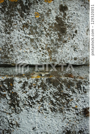 A wall with a grey and white surface. Vertical composition ideal for phone wallpaper or minimal nature backgrounds. A wall with a grey and white surface. Vertical composition ideal for phone wallpaper or minimal nature backgrounds. 129320851