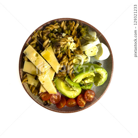 Balanced lunch with pasta, avocado and egg Balanced lunch with pasta, avocado and egg 129321233