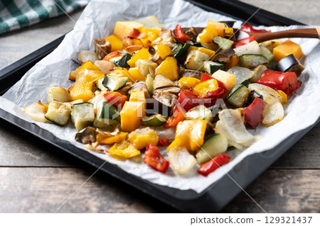 Roasted vegetables on a baking tray Roasted vegetables on a baking tray 129321437