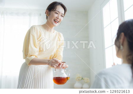 Middle-aged woman drinking tea 129321613