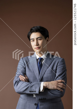 Smiling young man in a suit 129321746