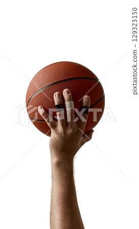 Male hand holding basketball with taped fingers isolated on white background 129323150