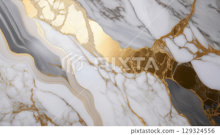 Polished marble surface with intricate veining patterns in gold and gray tones Polished marble surface with intricate veining patterns in gold and gray tones 129324556